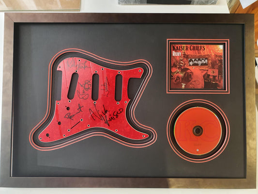 Kaiser Chiefs Signed Guitar Scratch Plate Framed. - Darling Picture Framing